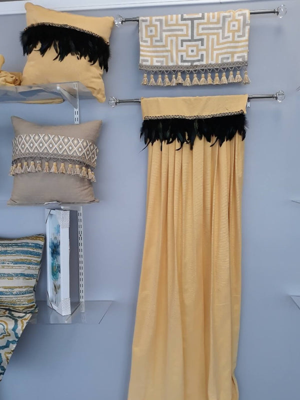 Gold curtain with black feathers